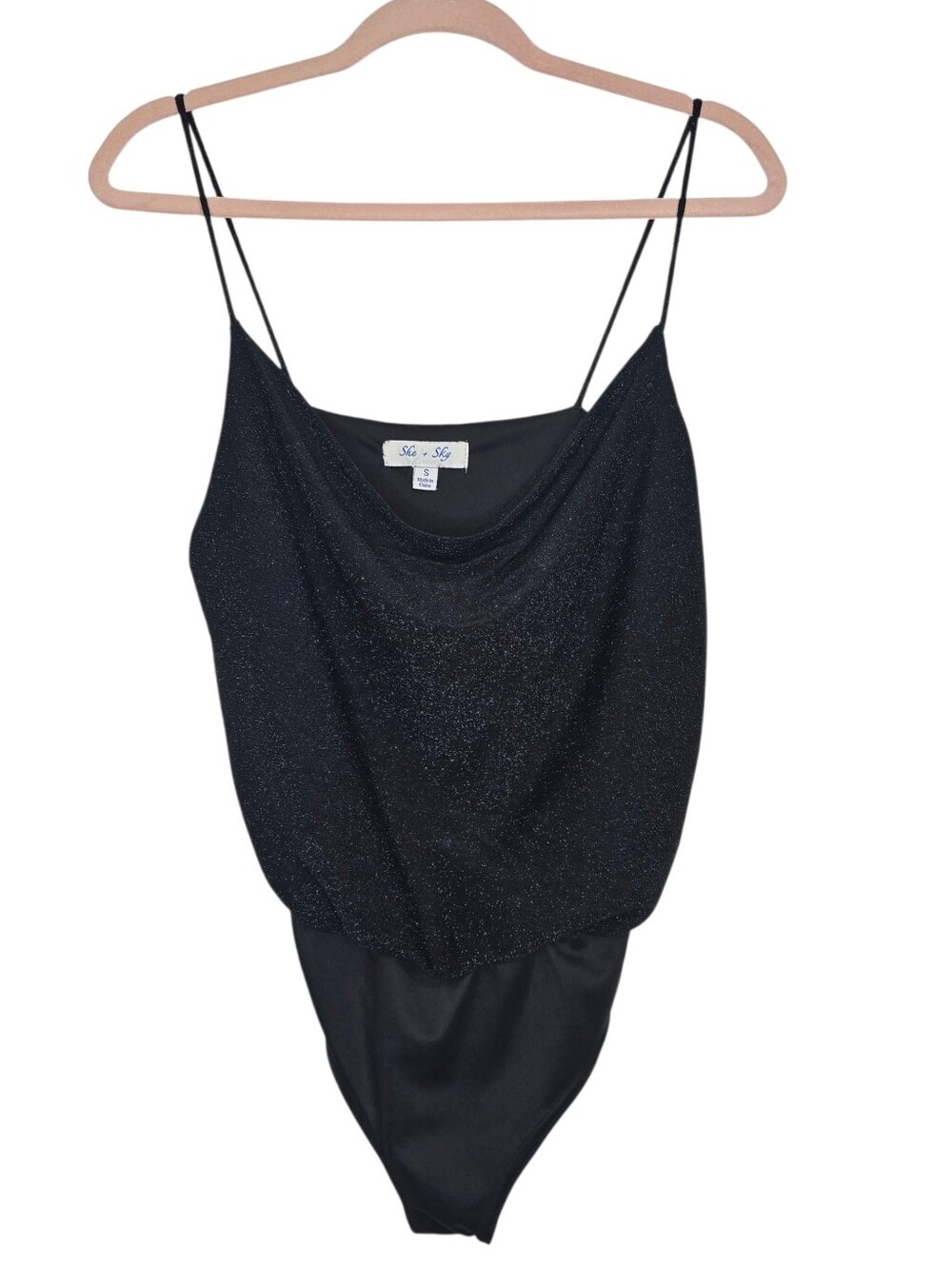 She + Sky black shimmer bodysuit features a cowl neck and thin spaghetti straps
